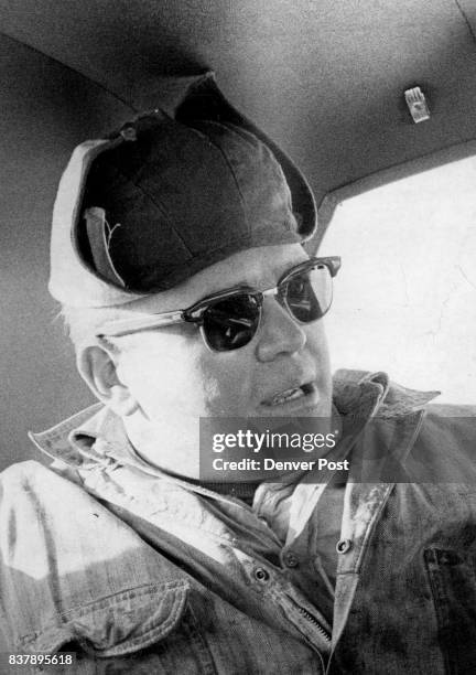 Lochnikar Silver Plume, Colo., and Ed Seay Idaho Springs, Colo., both Highway Department employes, watched a party of seven climb a slope above U.S....