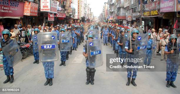 Punjab Police along with jawans of CRPF take out flag march to keep the law and order situation under control in the district as members of Dera...