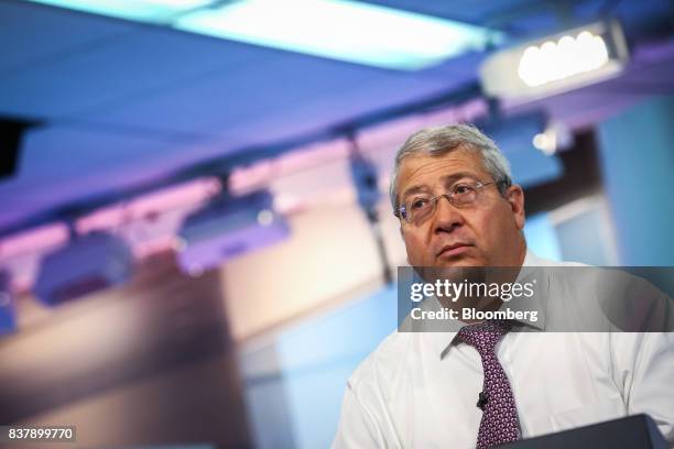 Steve Ricchiuto, chief U.S. Economist of Mizuho Securities USA LLC, listens during a Bloomberg Television interview in New York, U.S., on Wednesday,...