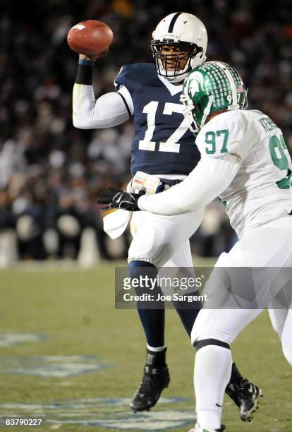 Darryl Clark of the Penn State Nittany Lions scrambles in front of Justin Kershaw of the Michigan State Spartans on November 22, 2008 at Beaver...