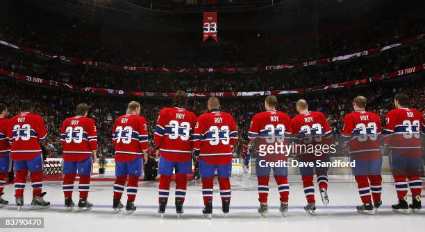 Members of the Montreal Canadiens all wear to honour Patrick Roy during a ceremony to retire his before the Boston Bruins face the Montreal Canadiens...