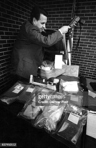 https://media.gettyimages.com/id/837910112/photo/apr-3-1987-william-shearer-ccp-adams-co-takes-bags-of-80-pure-cocaine-out-of-a-suitcase-that.jpg?s=612x612&w=gi&k=20&c=panrncf49GRywTiv0oZognFyDIy-mb__JrbAWFdTqks=