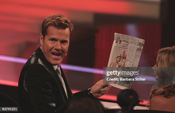 Dieter Bohlen shows Sylvie van der Vaart a picture of Paula Hessel-Sousa during the semifinal of the TV show 'The Supertalent' on November 22, 2008...