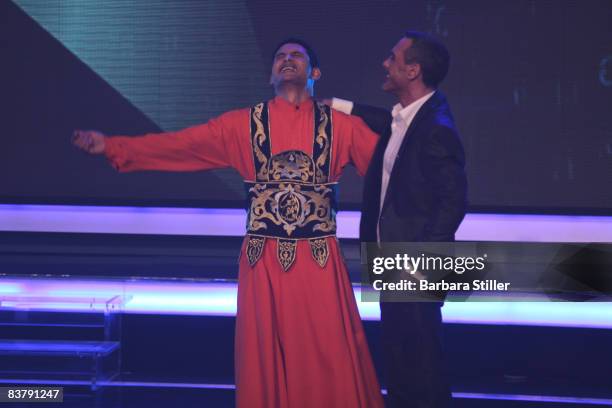 Shinouda Ayad and Carlos Fassanelli celebrate during the semifinal of the TV show 'The Supertalent' on November 22, 2008 in Cologne, Germany.