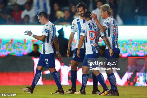 Keisuke Honda of Pachuca celebrates with teammates after scoring the fourth goal of his team during the sixth round match between Pachuca and...