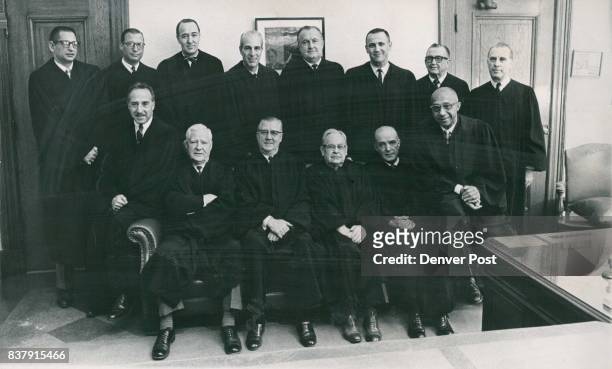 Thirteen of the 14 Judges of the Denver District Court Front row, left to right, are Mitchel B. Johns, Neil Horan, Gerald E. McAuliffe, Robert W....