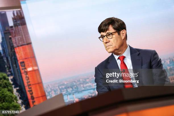 Milton Berg, founder and chief executive officer of Milton Berg Advisors LLC, listens during a Bloomberg Television interview in New York, U.S., on...