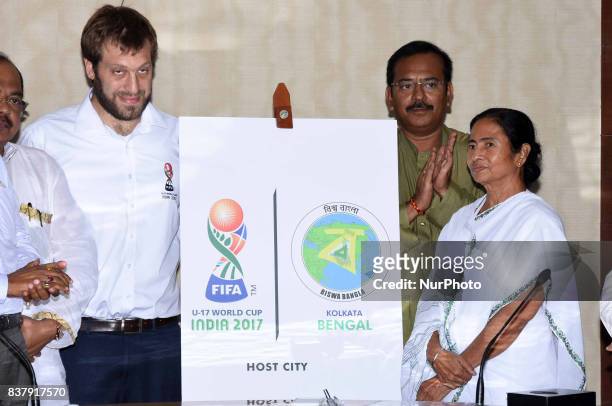 Tournament Director of FIFA U17, Javier Ceppi and West Bengal Chief Minister Mamata Banerjee lunches logos Fifa U 17 and Biswa Bangla at State...