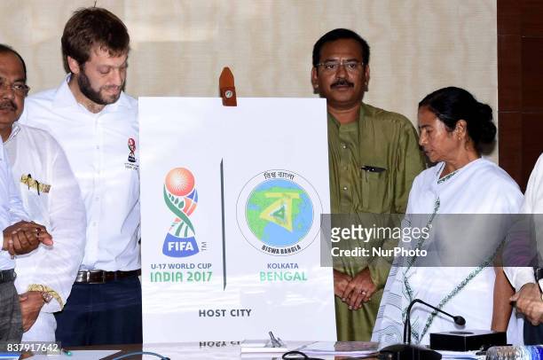 Tournament Director of FIFA U17, Javier Ceppi and West Bengal Chief Minister Mamata Banerjee lunches logos Fifa U 17 and Biswa Bangla at State...