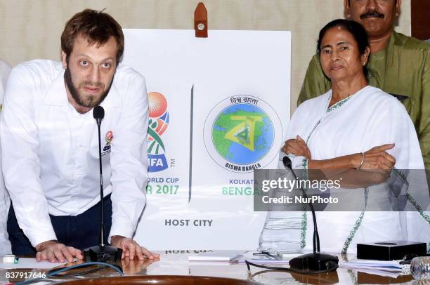 Tournament Director of FIFA U17, Javier Ceppi and West Bengal Chief Minister Mamata Banerjee lunches logos Fifa U 17 and Biswa Bangla at State...