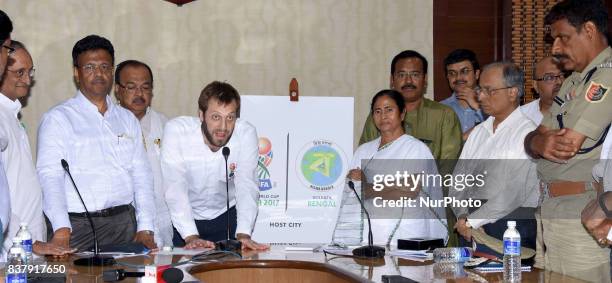 Tournament Director of FIFA U17, Javier Ceppi and West Bengal Chief Minister Mamata Banerjee lunches logos Fifa U 17 and Biswa Bangla at State...