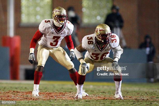Myron Rolle and Dekoda Watson of the Florida State Seminoles defend against the Maryland Terrapins on November 22, 2008 at Byrd Stadium in College...