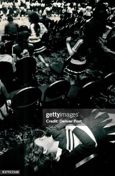 Too Pooped To Pom -- Kathy Magrogan a cheerleader at Machebuf High School gets some steep while cheerleaders from more than 50 high schools...