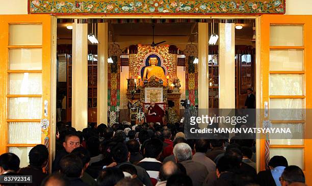 Tibetan spiritual leader the Dalai Lama addresses Tibetan in-exile delegates at his palace temple in Dharamsala on November 23, 2008. The Dalai Lama...
