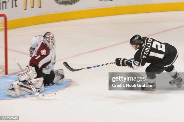 Peter Budaj of the Colorado Avalanche stops a shot on goal from Patrick O'Sullivan of the Los Angeles Kings during the game on November 22, 2008 at...