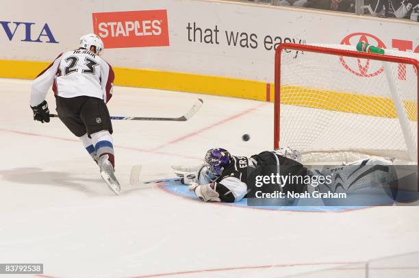 Milan Hejduk of the Colorado Avalanche shoots a goal in a shoot out against Erik Ersberg of the Los Angeles Kings during the game on November 22,...