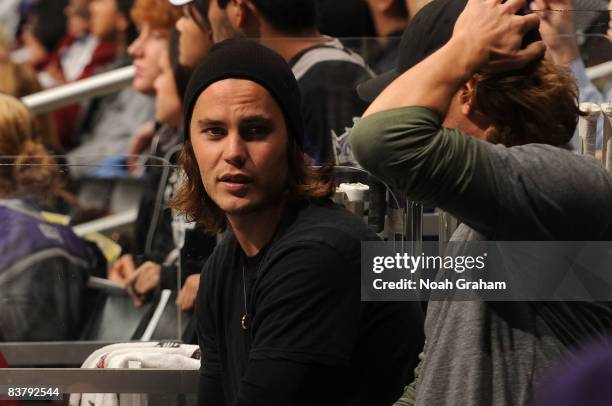 Actor Taylor Kitsch attends the NHL game between the Colorado Avalanche and the Los Angeles Kings during the game on November 22, 2008 at Staples...