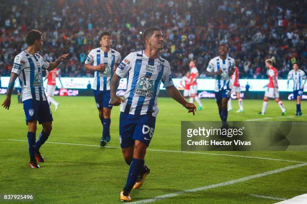 Victor Guzman of Pachuca celebrates with teammates after scoring the third goal of his team during the sixth round match between Pachuca and Veracruz...