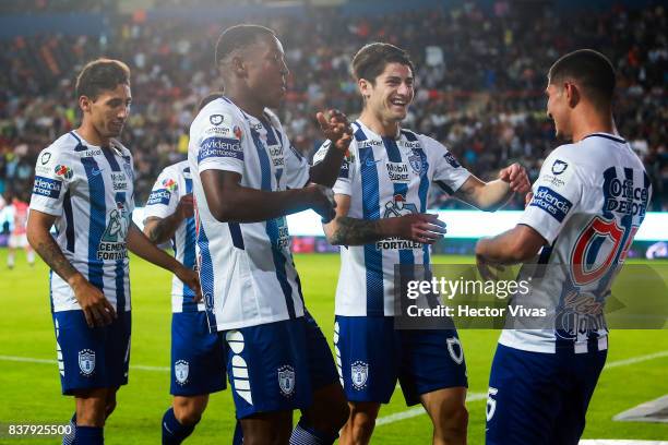 Victor Guzman of Pachuca celebrates with teammates after scoring the third goal of his team during the sixth round match between Pachuca and Veracruz...