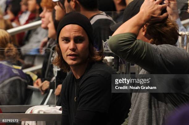 Actor Taylor Kitsch attends the NHL game between the Colorado Avalanche and the Los Angeles Kings during the game on November 22, 2008 at Staples...