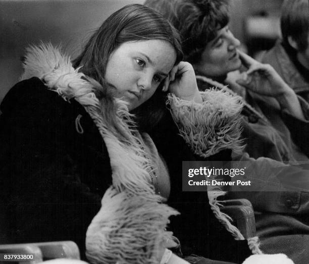 Darleen Carr,-14, above, waits Wednesday to be inter-viewed by Dr. Dick Wright, of the Colorado Department of Health, in a tie pt to discover the...