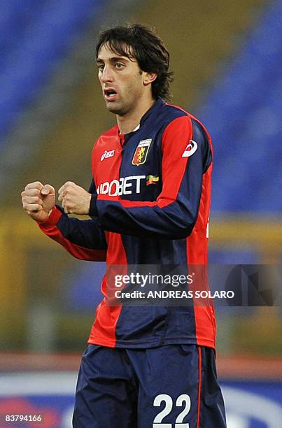 Genoa's Argentine forward Diego Alberto Milito celebrates after scoring against Lazio during their Italian Serie A football match on November 23,...