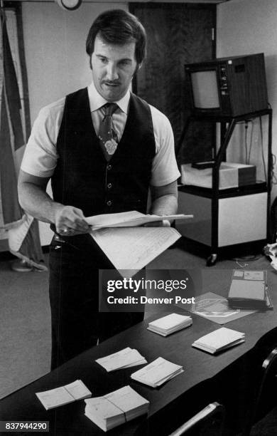 Lakewood Police Arrest ***** Capt. Jim O'Dell, left, of the Lakewood Department of Public Safety looks over prescription blanks and a scrapbook...