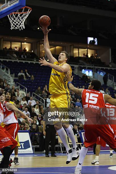 Patrick Femerling of Alba Berlin vies for the ball with Christopher Copeland of Trier during the Basketball Bundesliga match between Alba Berlin and...