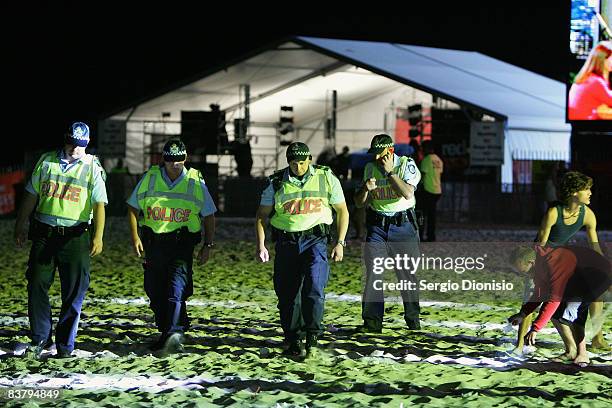 Police officers petrol the beach during the Schoolies week celebrations in Surfers Paradise on November 23, 2008 on the Gold Coast, Australia....