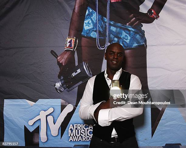 Trevor Nelson poses backstage with the MTV award at the MTV Africa Music Awards 2008 at the Abuja Velodrome on November 22, 2008 in Abuja, Nigeria.