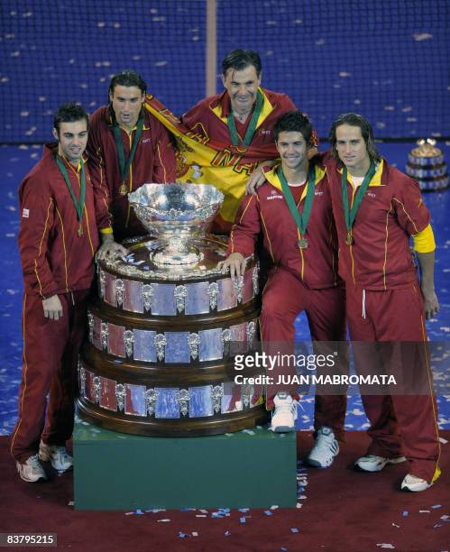 Spain's Davis Cup team members Marcel Granollers, David Ferrer, team captain Emilio Sanchez Vicario, Fernando Verdasco and Feliciano Lopez pose with...