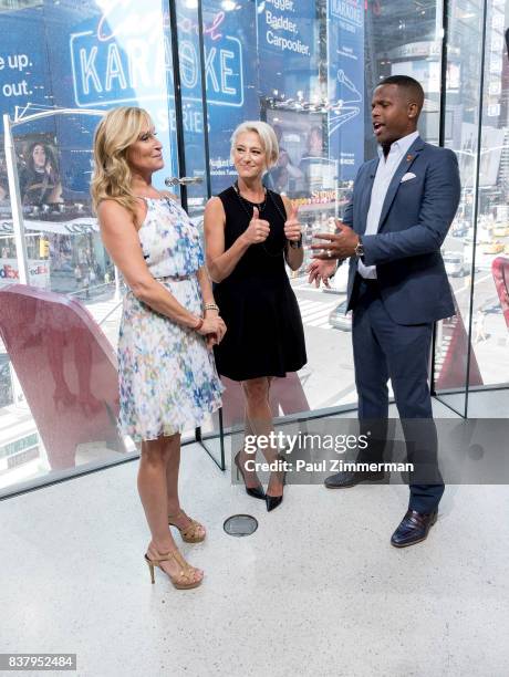 Personalities from 'Real Housewives of New York' Sonja Morgan, Dorinda Medley and AJ Calloway visit 'Extra' at their New York studios at H&M in Times...