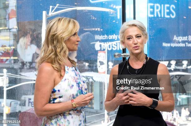 Personalities from 'Real Housewives of New York' Sonja Morgan and Dorinda Medley visit 'Extra' at their New York studios at H&M in Times Square on...