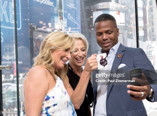 Personalities from 'Real Housewives of New York' Sonja Morgan, Dorinda Medley and AJ Calloway visit 'Extra' at their New York studios at H&M in Times...