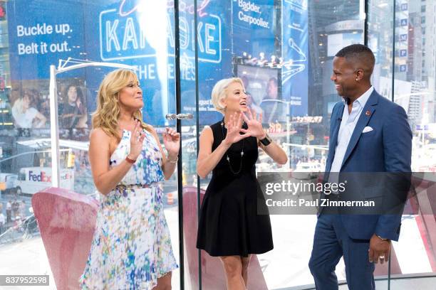 Personalities from 'Real Housewives of New York' Sonja Morgan, Dorinda Medley and AJ Calloway visit 'Extra' at their New York studios at H&M in Times...