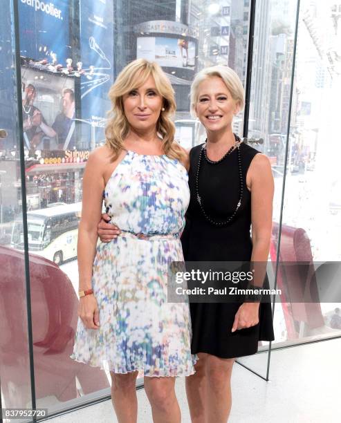 Personalities from 'Real Housewives of New York' Sonja Morgan and Dorinda Medley visit 'Extra' at their New York studios at H&M in Times Square on...