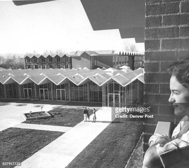 New home for du students Graduate student Jean Wrust of Kansas City, Mo., surveys the new residence complex at Du from one wing of the dormitory. In...