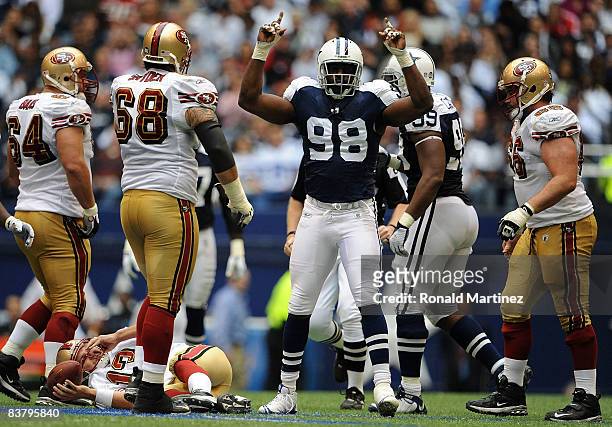 Linebacker Greg Ellis of the Dallas Cowboys reacts after a sack against Shaun Hill of the San Francisco 49ers at Texas Stadium on November 23, 2008...