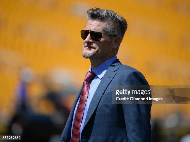 General manager Thomas Dimitroff of the Atlanta Falcons stands on the field prior to a preseason game on August 20, 2017 against the Pittsburgh...