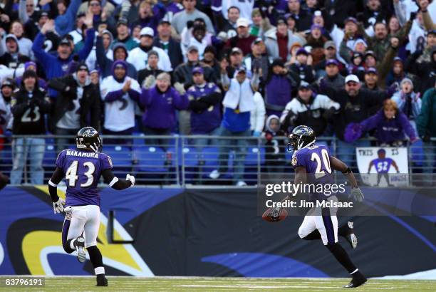 Ed Reed of the Baltimore Ravens enters the endzone with teammate Haruki Nakamura after his interception against the Philadelphia Eagles on November...