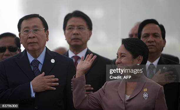 Phillipine president Gloria Arroyo waves during a ceremony in honor of the Phillipine hero Jose Rizal , in the framework of the Asia-Pacific Economic...