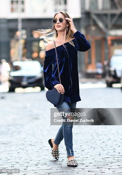 Rosa Crespo is seen in Soho wearing an Alexandrino blue top, Tularosa jeans, Molly Bracken bag and Alexander Wang shoes on August 22, 2017 in New...