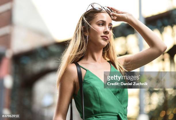 Rosa Crespo is seen in Soho wearing an Iorane green dress on August 22, 2017 in New York City.