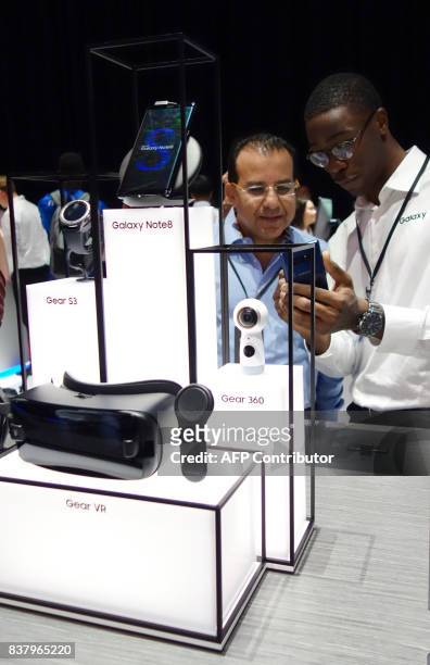 Members of the media get a look at the Samsung Galaxy Note 8 after it was unveiled at the Samsung Galaxy Unpacked 2017 event on August 23, 2017 in...