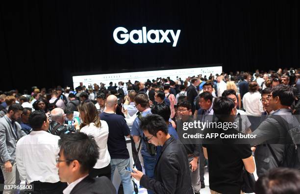 Members of the media get a look at the Samsung Galaxy Note 8 after it was unveiled at the Samsung Galaxy Unpacked 2017 event on August 23, 2017 in...