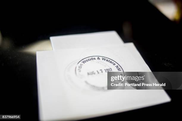 The Katahdin Woods and Waters National Monument passport stamp at the welcome center in Patten.