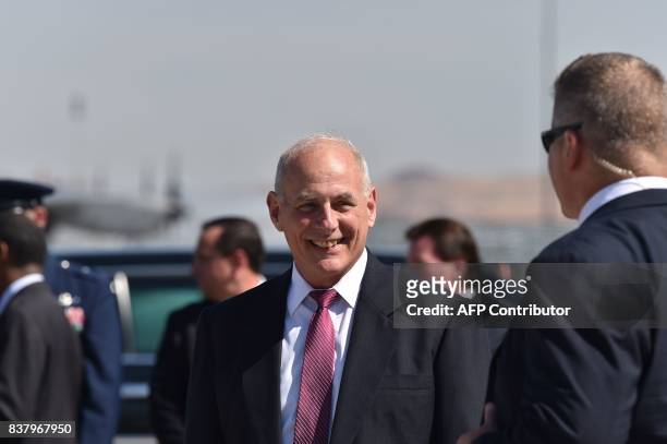 White House chief of staff John Kelly arrives with US President Donald Trump in Reno, Nevada on August 23 where President Trump will speak to the...