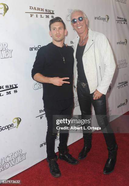 Musician Dee Snider and son Cody Snider arrive for the "Hatchet" 10th Anniversary Celebration held at ArcLight Cinemas on August 22, 2017 in...