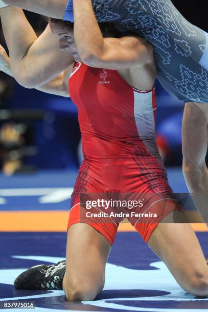 Mathilde Riviere of France and Iryna Kurachkina of Bielorussia during the female 55 kg wrestling competition of the Paris 2017 Women's World...