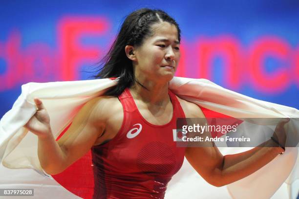 Haruna Okuno of Japan celebrates during the female 55 kg wrestling competition of the Paris 2017 Women's World Championships at AccorHotels Arena on...